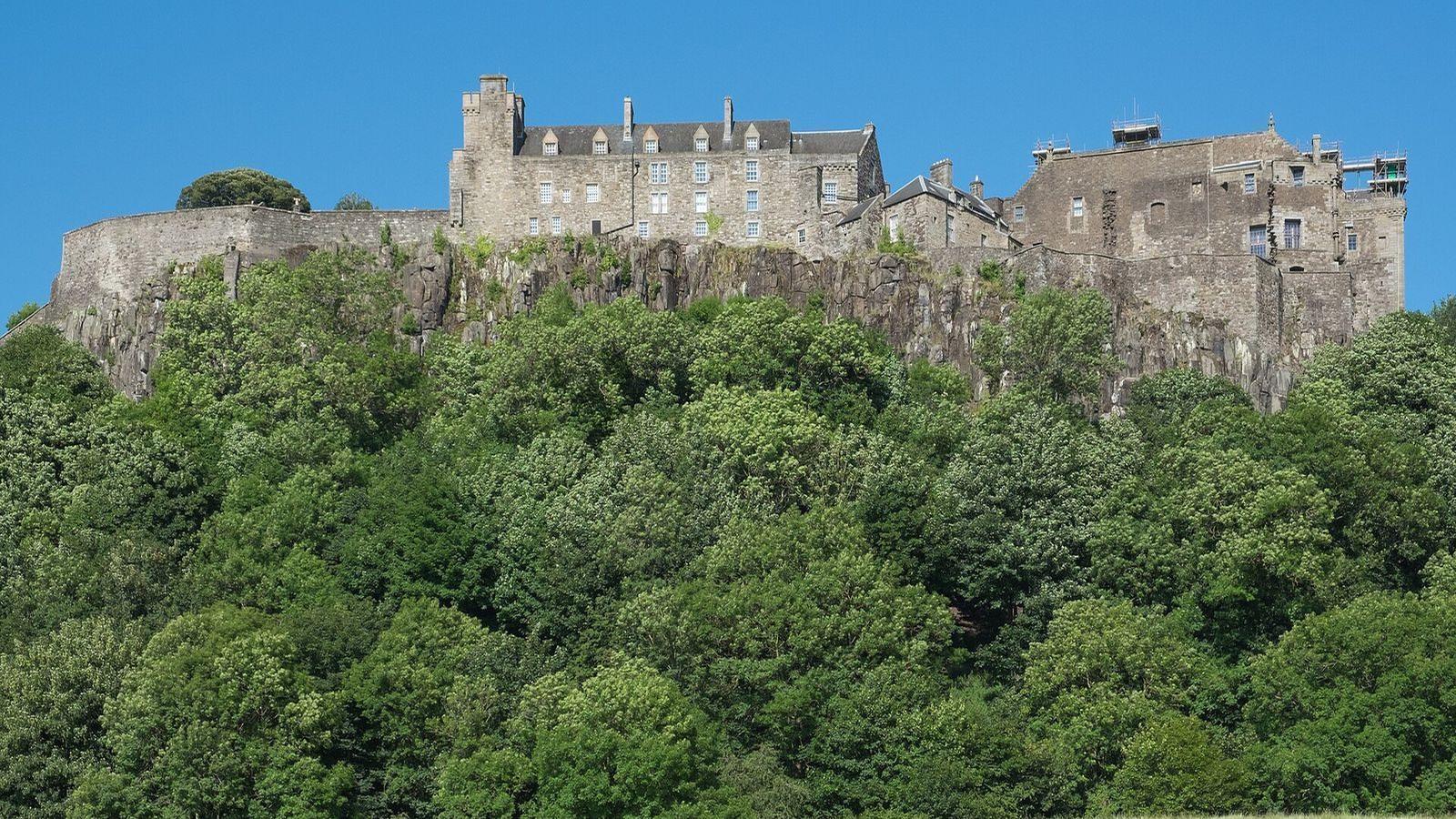Stirling Castle on its volcanic crag above the trees